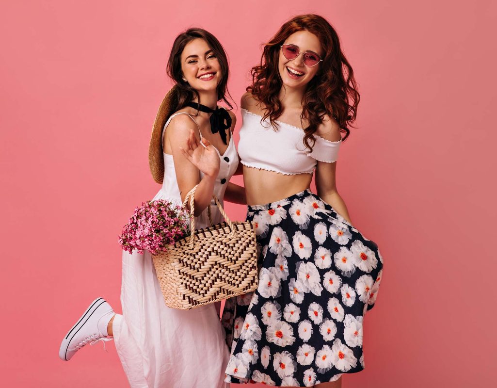 happy-lady-stylish-skirt-boater-posing-pink-wall